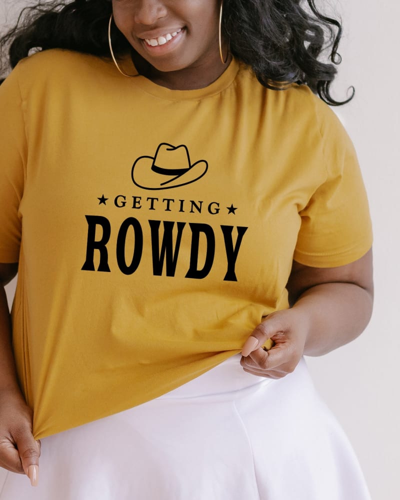 Front of a model wearing a size Large Getting Rowdy Cowboy Hat in Mustard by Simply Sage Market. | dia_product_style_image_id:281492
